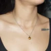 Tiger's Eye sphere pendant necklace for protection and confidence.